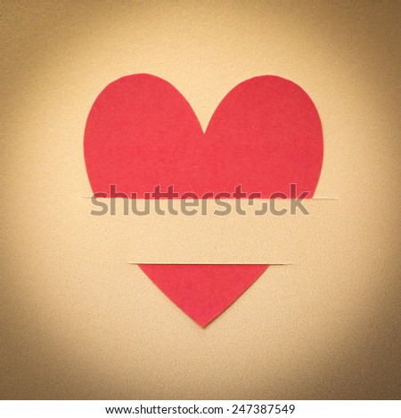 Paper hearts on gold paper background