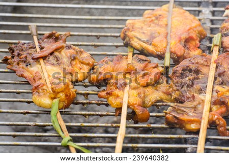 Grilled chicken was spread out with bamboo stick. local food