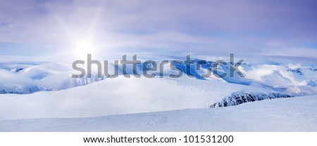 Snowy arctic mountains in sunny day.