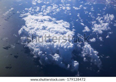 Cloudscape. Blue sky and white cloud. Sunny day. Cumulus cloud under ocean.
