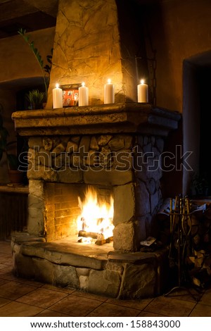 Fireplace Room. Chimney, Candles And Woodpile. Chimney Place. Christmas.