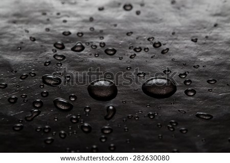 Abstract water drops art. Bubbles black background. Texture. macro view, soft focus.