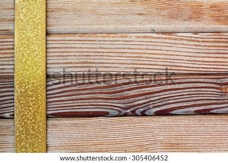 Aged brass rim, natural  wood pattern background. Wooden tiles frame, Different kinds wood planking texture. Macro view.