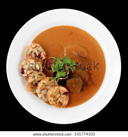 Veal fillet with rich sauce and dumplings - traditional Czech dish cooked in modern way
