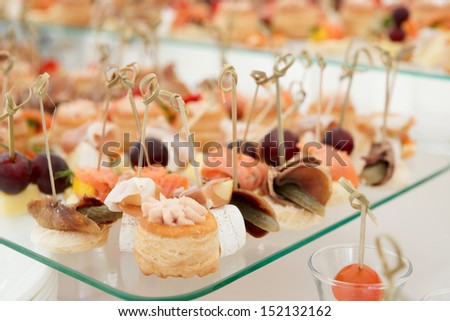 Various meat, fish and cheese banquet snacks
