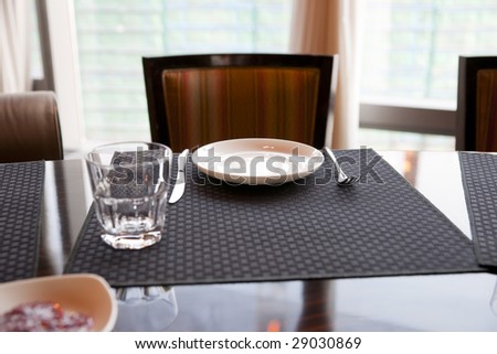 Restaurant table arrangement, shallow focus, back light