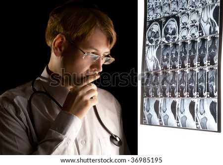 Young puzzled doctor thinking about the diagnosis