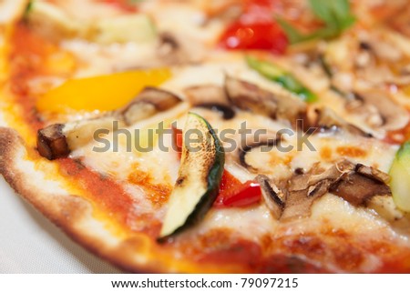 Tasty vegetable pizza close-up, selective focus, macro