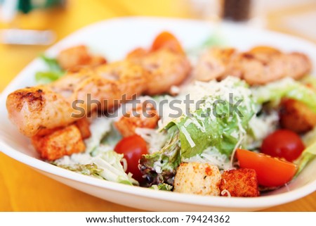 Caesar salad with grilled chicken fillet, parmesan cheese and croutons