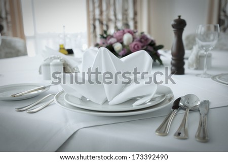 Place setting in an expensive haute cuisine restaurant