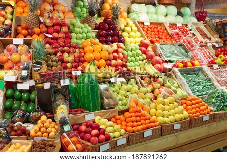 Shelf with fruits on a farm market, trademarks blurred or removed