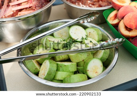 Vegs, meat  and fruits are prepared for grilling