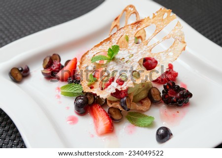 Asian fruit dessert with lotus root and berries