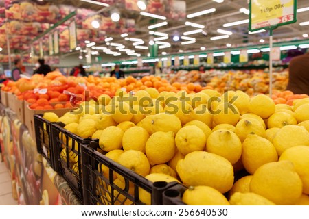 Crates with citrus fruits in a food store