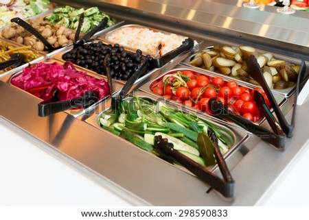 Pickled vegetables on self service restaurant counter