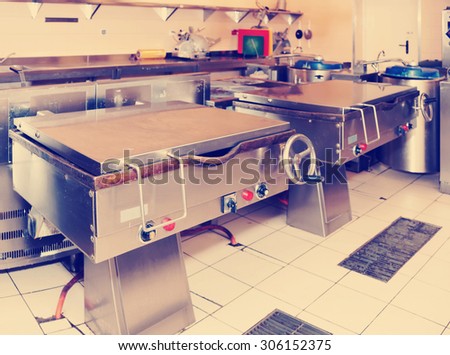 Typical kitchen of a big food processing plant, toned image