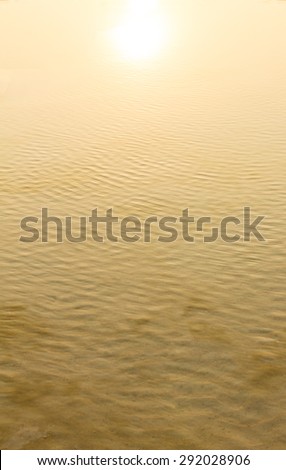 Sunshine reflecting on the surface of sea water