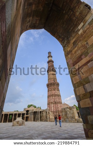 NEW DELHI - AUGUST 7, 2014 : People travel visiting in Qutub Minar,August 7, 2014 in New Delhi, India.