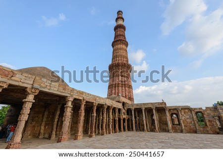 NEW DELHI - AUGUST 7, 2014 : People travel visiting in Qutub Minar,August 7, 2014 in New Delhi, India.