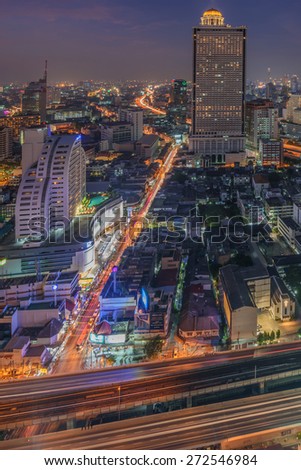 Bangkok, Thailand - April 6, 2015: Birds eye view of Bangkok city along the river during sunset and twillight