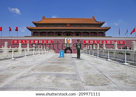BEIJING, CHINA - APRIL 8: Police Officer in Tiananmen Square near the Forbidden City Door on April 8, 2013 in Beijing, China