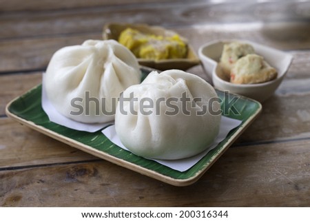 Chinese Steamed Buns and variety of dim sum, traditional Thai and Chinese breakfast
