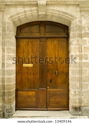 Old oak door with carved stone surround