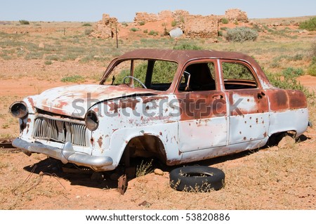 stock photo Old rusty wrecked car in Outback Australia