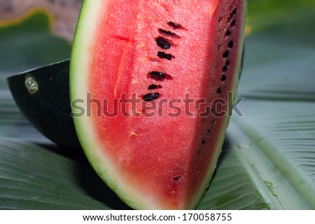 Watermelon isolated on banana leaf