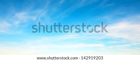 Panorama of blue sky with white clouds in clear weather on a sunny day