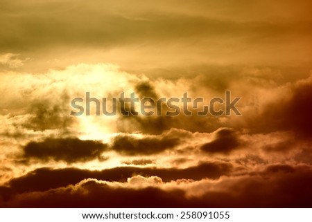 beautiful bright sunset, gloomy sky in clouds