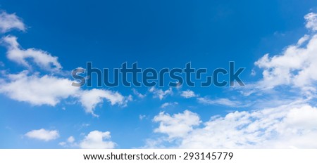 blue sky, white clouds, horizontal view