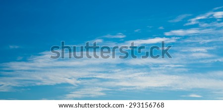 horizontal arrangement of abstract clouds in a blue sky