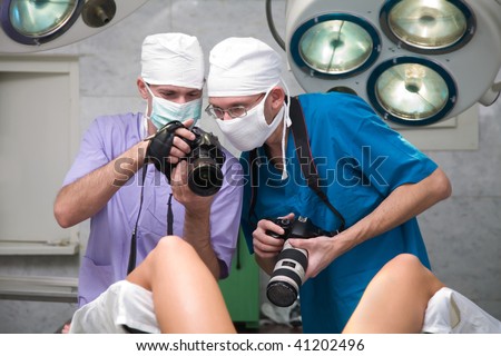 Photographers paparazzi in hospital behind work