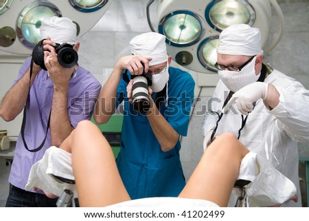 Photographers paparazzi in hospital behind wor