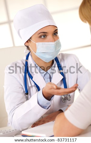 Young girl takes the patient\'s physician