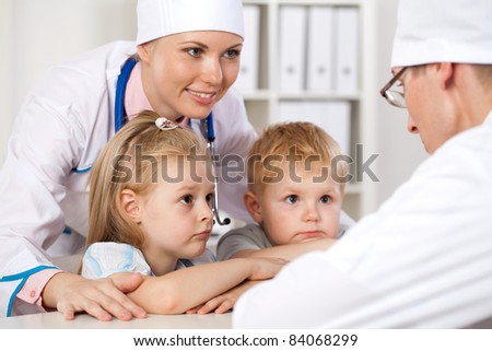 children at a reception at the doctor