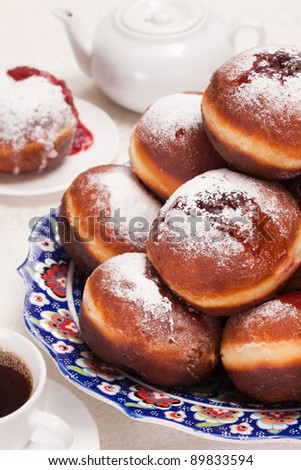 Jewish holiday baking donuts with syrup