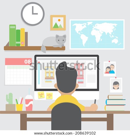 Graphic designer working with computer in home office workspace