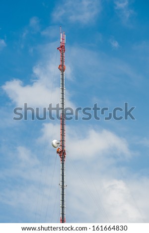 Tower climber and working on cellular tower system.
