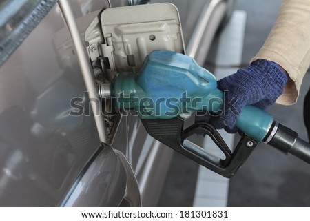 close up gas pump for refueling car on gas station