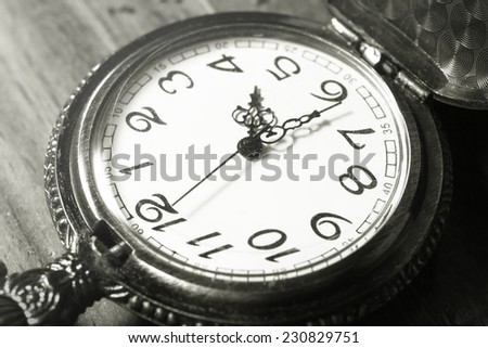 Closeup pocket watch,black and white color filtered.