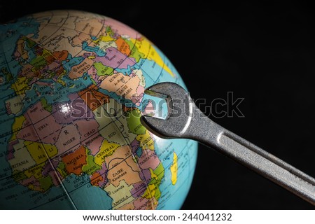Wrench and globe,repair the world.