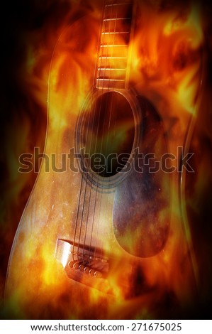 Acoustic guitar with fire flame screen.