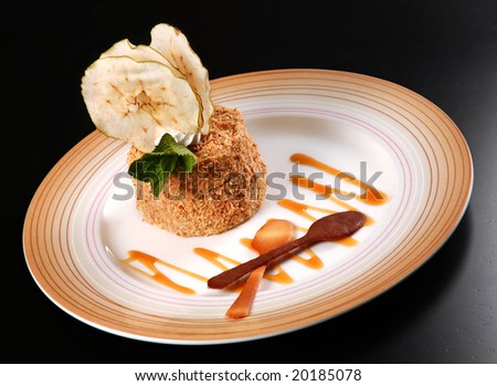 Dessert cake with apple slice on black background