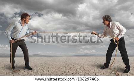 Businessman and pull the rope, challenge concept