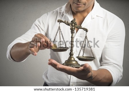 Concept of earning balance with businessman that weighs the money