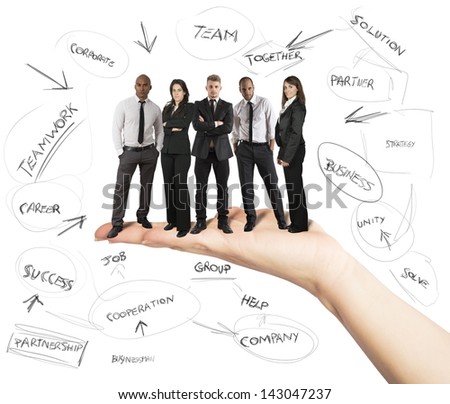 Hand holds a successful business team