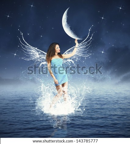 Creative fashion with fairy touching the moon