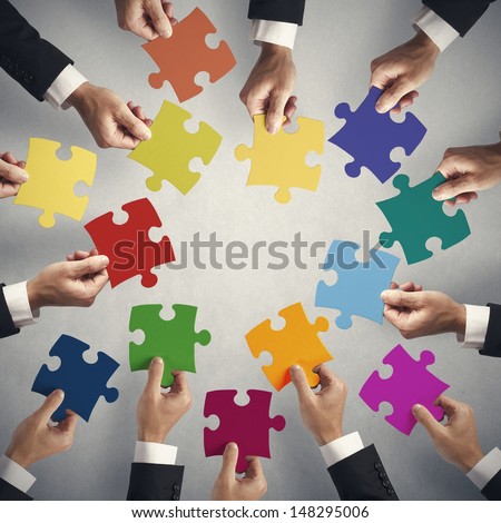 Teamwork And Integration Concept With Puzzle Pieces